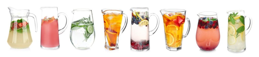 pitchers of beverages with fruit